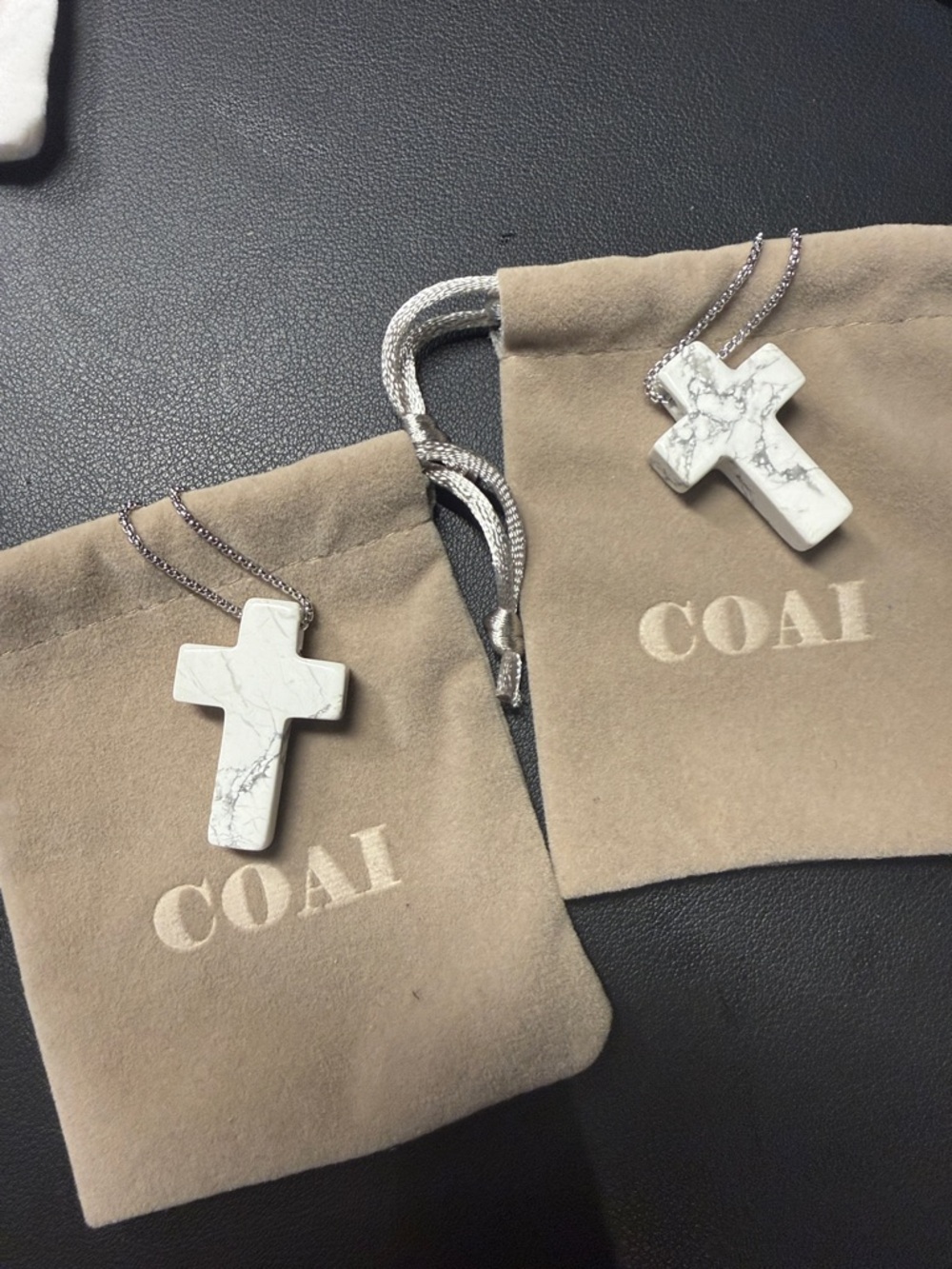 Coai stone cross on silver chain